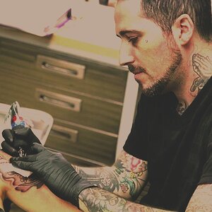 Justin tattoo artist
